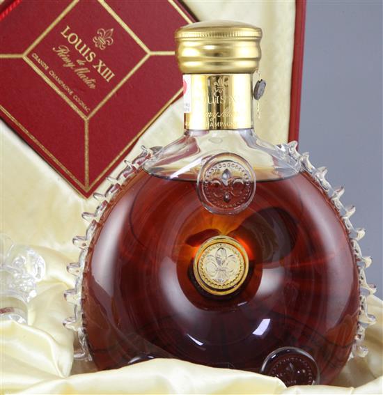 A boxed Louis XIII de Remy Martin Grande Champagne Cognac in a Baccarat Crystal decanter.